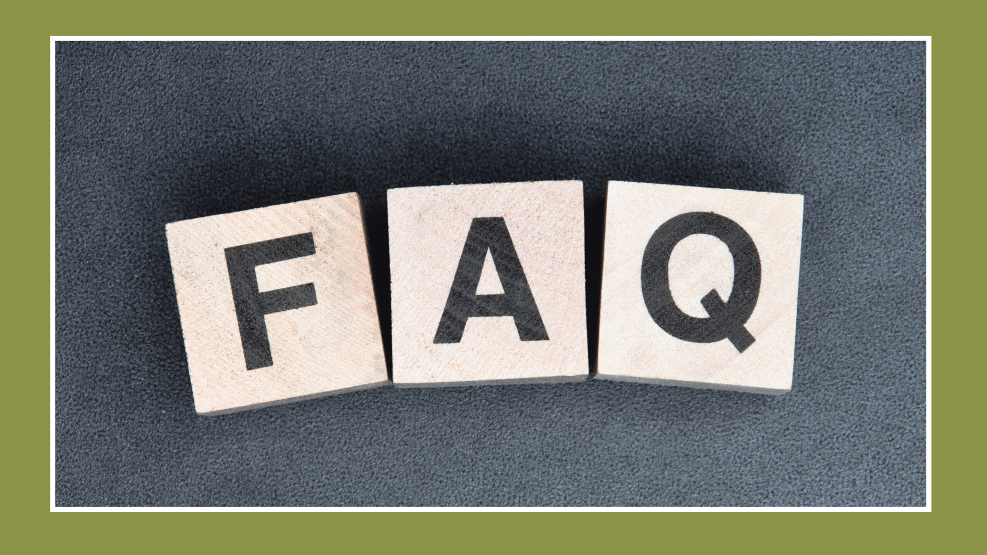 Wooden blocks spelling out FAQ, centered on a gray textured background, signaling a frequently asked questions section.
