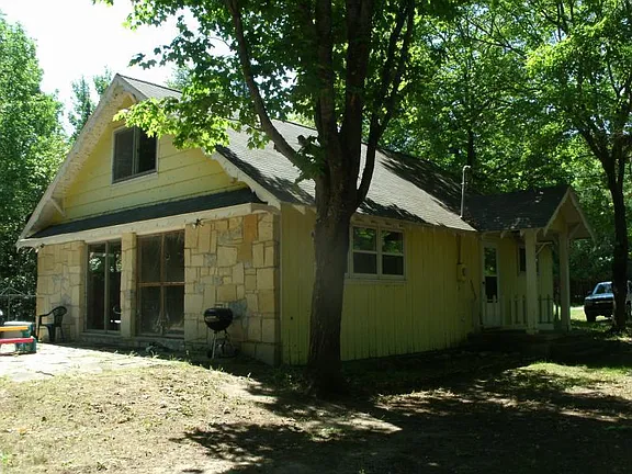 Exterior view of a fixer-upper property