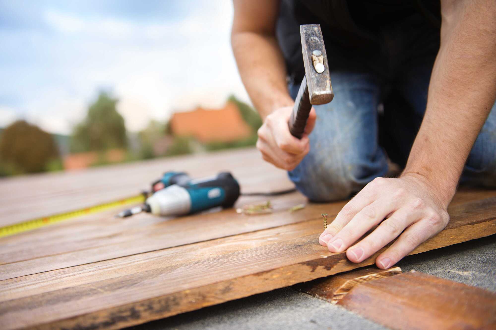 man using hammer